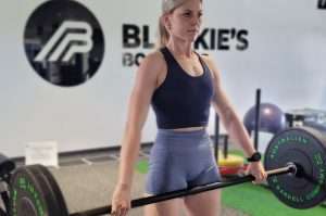 Fit and strong looking female lifting weights